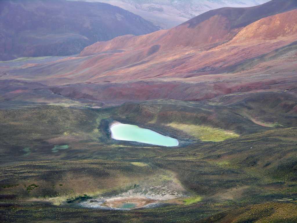 Tibet Guge 01 To 07 Lake and Hills Just 13km after leaving the main road at Sangsha on the way to Tholing, we crested a pass (5150m) and had a fantastic view of a colourful lake and surrounding hills.